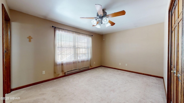 empty room featuring light colored carpet, ceiling fan, and baseboard heating