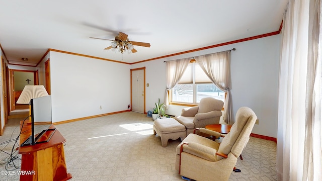 living area featuring crown molding, light carpet, and ceiling fan