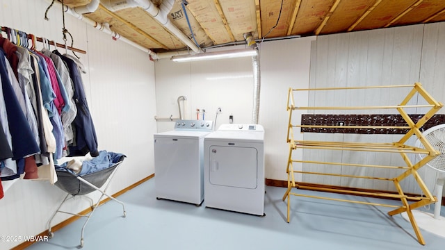 laundry area with washing machine and dryer