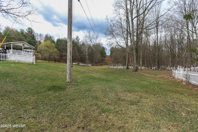 view of yard featuring fence