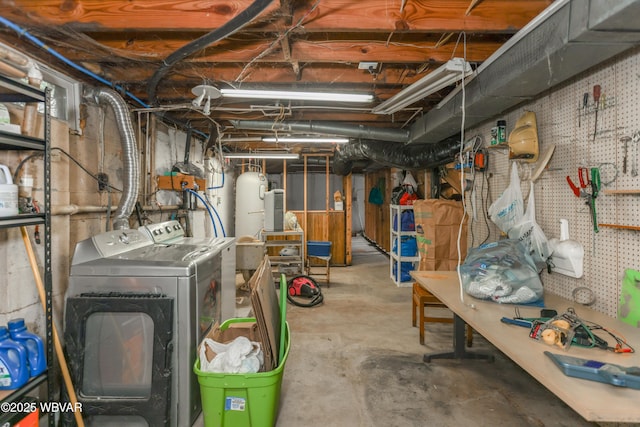 unfinished basement featuring independent washer and dryer