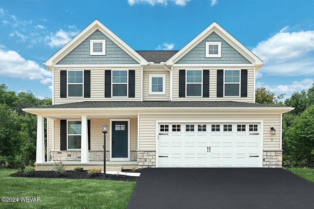 craftsman-style house featuring a garage and a porch