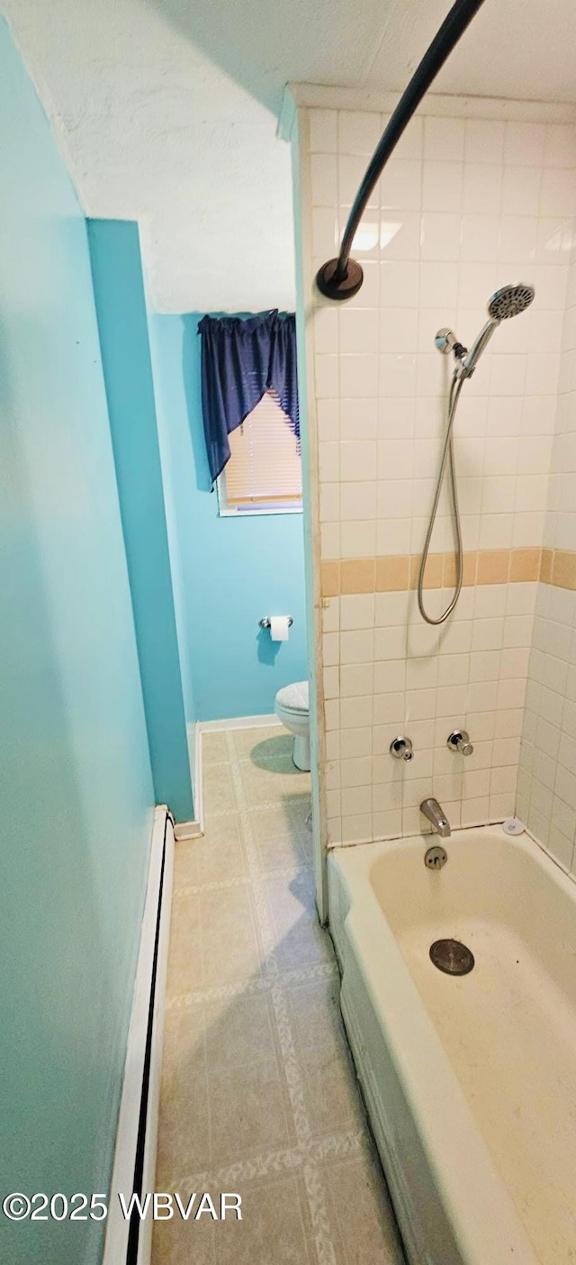 103 Lower Market St, Milton, PA 17847 - bathroom with a baseboard radiator, toilet, and  shower combination