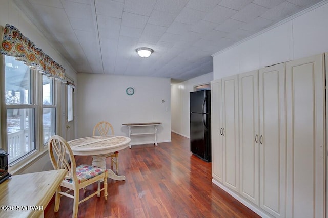 dining room featuring dark wood-style floors