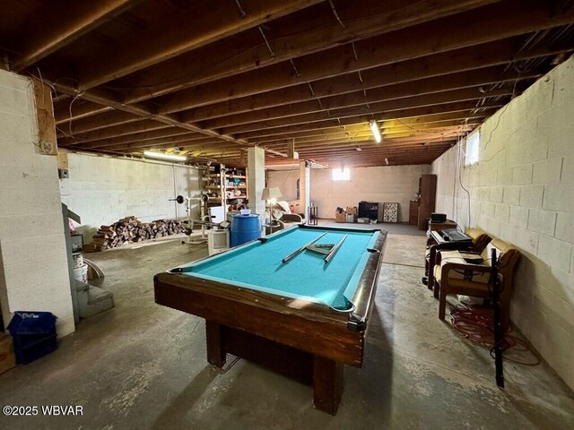 recreation room with billiards and unfinished concrete floors