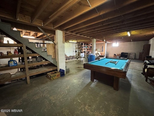 playroom with unfinished concrete floors and pool table