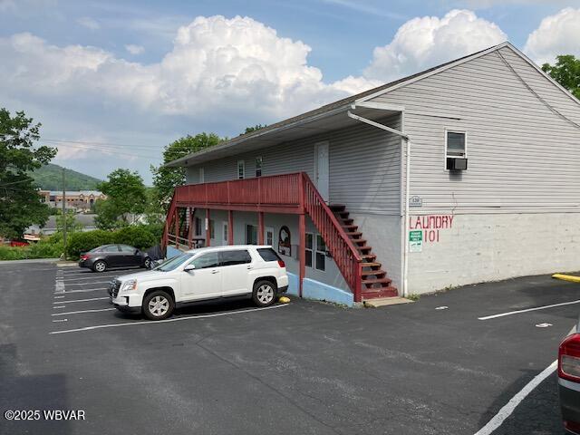 130 N Fairview St, Lock Haven, PA 17745 - exterior space with stairway and uncovered parking