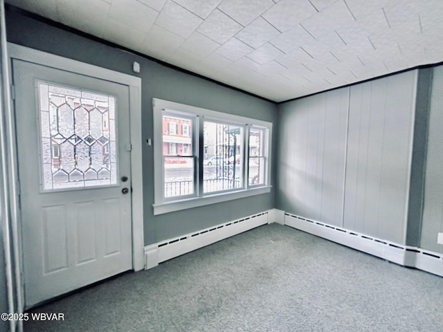 view of carpeted foyer