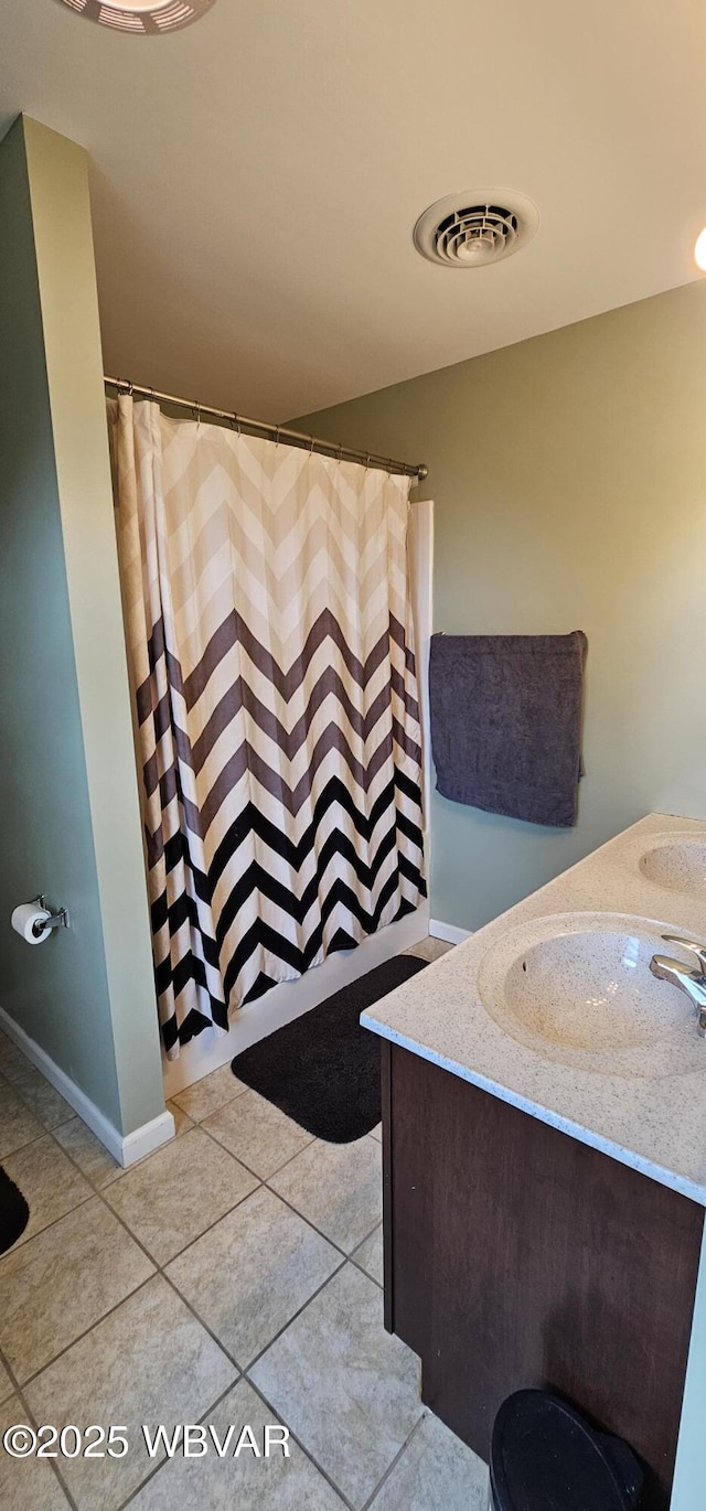 250 Mclaughlin Rd, Milton, PA 17847 - bathroom with tile patterned floors, a shower with curtain, vanity, and toilet