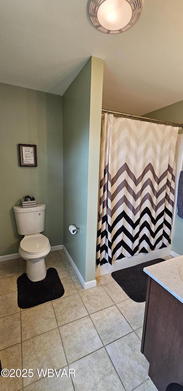 250 Mclaughlin Rd, Milton, PA 17847 - full bath with tile patterned floors, toilet, vanity, baseboards, and a shower with curtain