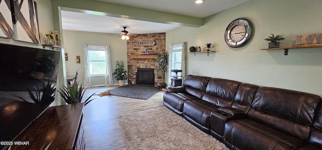 250 Mclaughlin Rd, Milton, PA 17847 - living room featuring a stone fireplace, wood finished floors, ceiling fan, and recessed lighting
