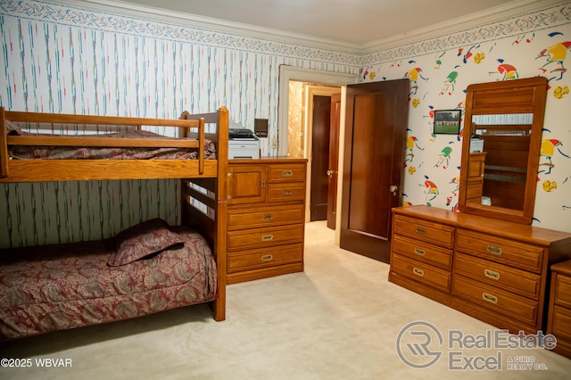 carpeted bedroom featuring crown molding