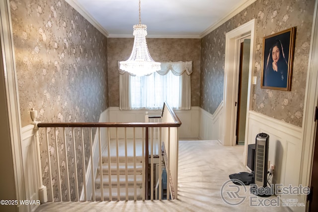 corridor featuring crown molding and carpet floors