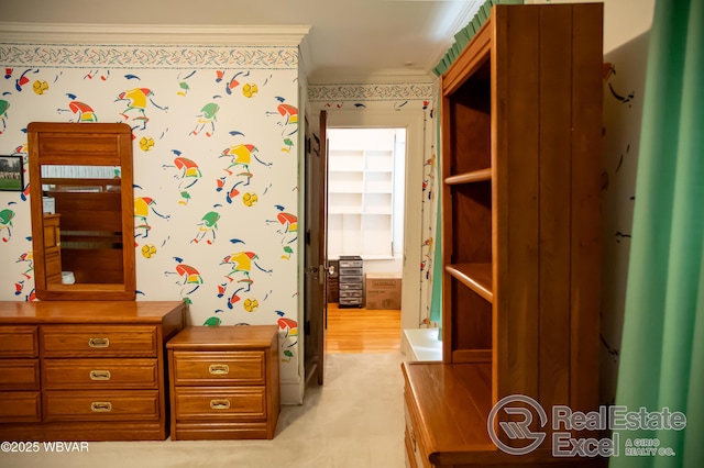 bedroom with crown molding