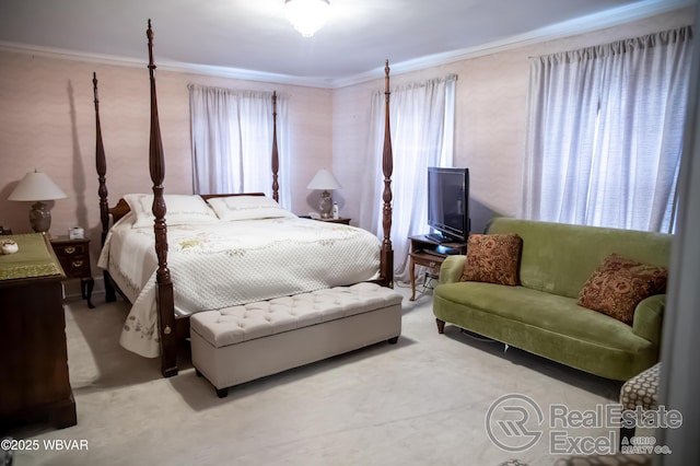 bedroom with crown molding