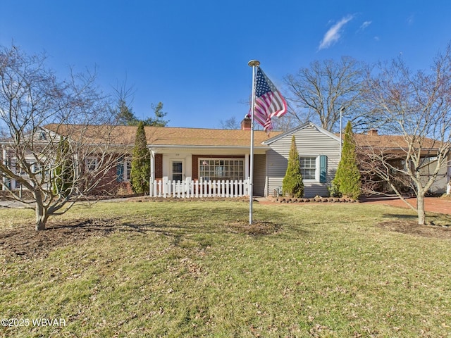 ranch-style house with a front yard