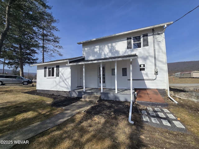 view of front of home featuring covered porch