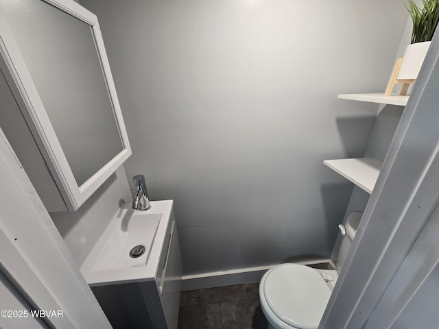 387 Davidson Rd, Jersey Shore, PA 17740 - bathroom with baseboards, toilet, and vanity