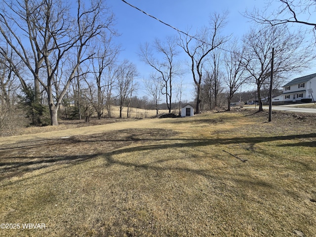 387 Davidson Rd, Jersey Shore, PA 17740 - view of yard featuring a storage unit and an outdoor structure
