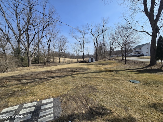 387 Davidson Rd, Jersey Shore, PA 17740 - view of yard featuring a storage unit and an outdoor structure