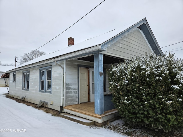 view of snow covered property