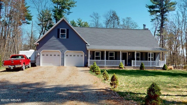view of front of property with a porch, a front yard, dirt driveway, and a garage