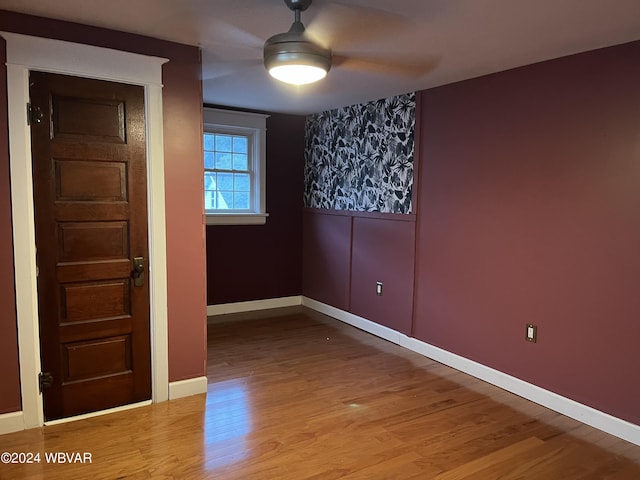 spare room featuring hardwood / wood-style floors