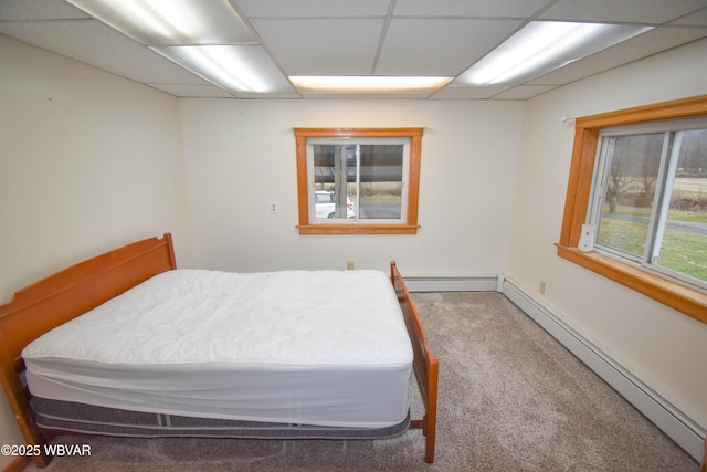 992-998 Eagle Valley Rd, Beech Creek, PA 16822 - bedroom featuring a drop ceiling, carpet, and a baseboard heating unit