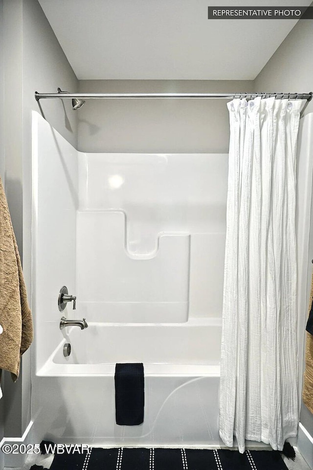 2287 Warrensville Rd, Montoursville, PA 17754 - bathroom featuring shower / bath combination with curtain
