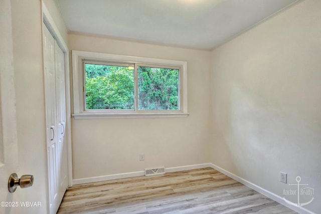 294 Park Ave, Lock Haven, PA 17745 - unfurnished room featuring wood finished floors, baseboards, and ornamental molding