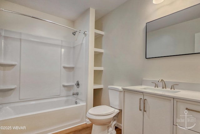 294 Park Ave, Lock Haven, PA 17745 - full bath with wood finished floors, toilet, vanity, and tub / shower combination