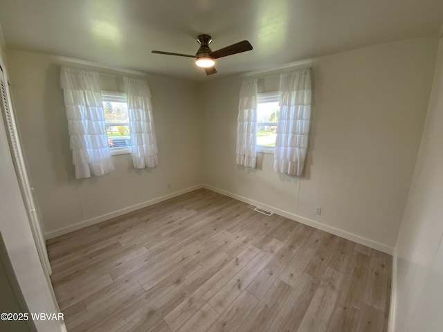 2437 Vista Rd, Williamsport, PA 17701 - empty room featuring light wood-style flooring, ceiling fan, baseboards, and visible vents