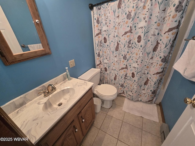 full bathroom with tile patterned flooring, toilet, vanity, and baseboard heating