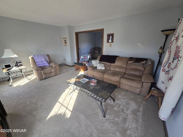 living room with a baseboard heating unit and carpet flooring