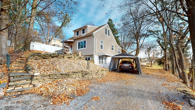 view of home's exterior with a gazebo