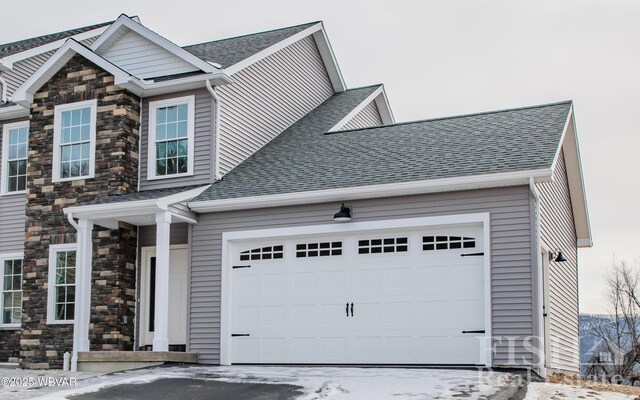 rear view of property featuring a yard