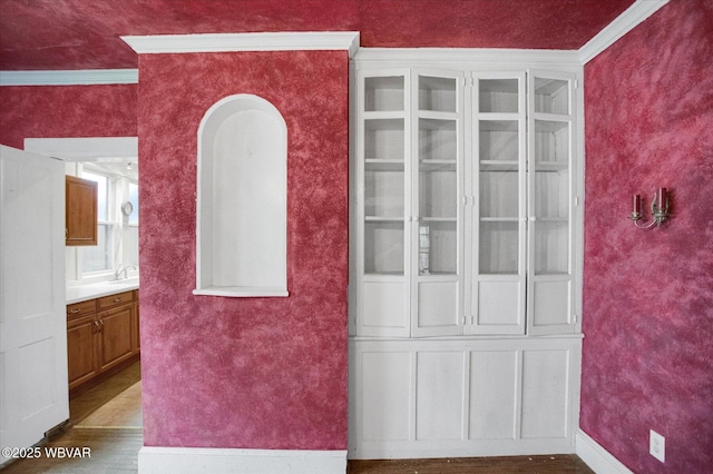 330 High St, Williamsport, PA 17701 - interior space featuring wood finished floors, baseboards, crown molding, and a sink