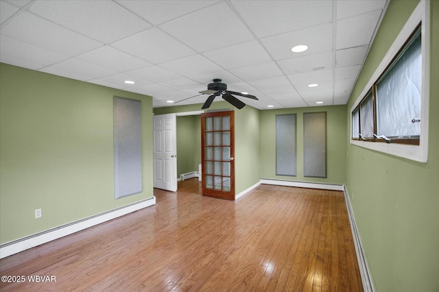 330 High St, Williamsport, PA 17701 - spare room with a baseboard radiator, a paneled ceiling, baseboards, wood finished floors, and recessed lighting