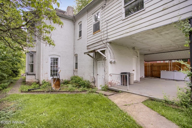 330 High St, Williamsport, PA 17701 - view of front of home featuring brick siding and a patio