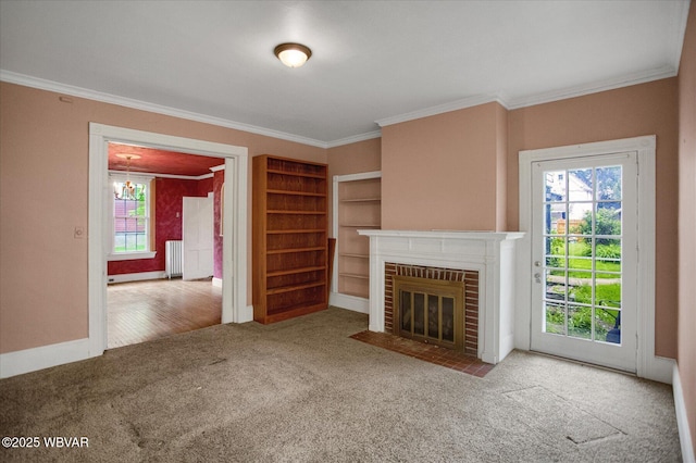 330 High St, Williamsport, PA 17701 - unfurnished living room featuring carpet, ornamental molding, radiator, a fireplace, and a chandelier