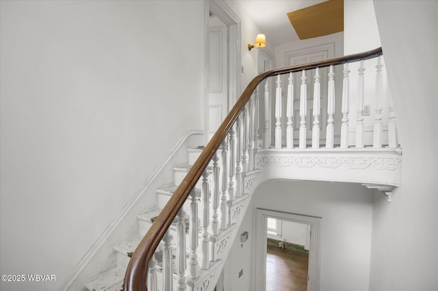 330 High St, Williamsport, PA 17701 - stairs featuring wood finished floors and a high ceiling