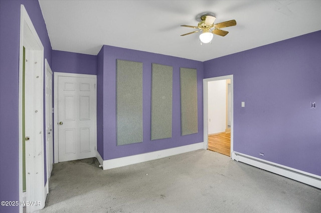 330 High St, Williamsport, PA 17701 - unfurnished bedroom featuring a baseboard heating unit, baseboards, carpet floors, and ceiling fan