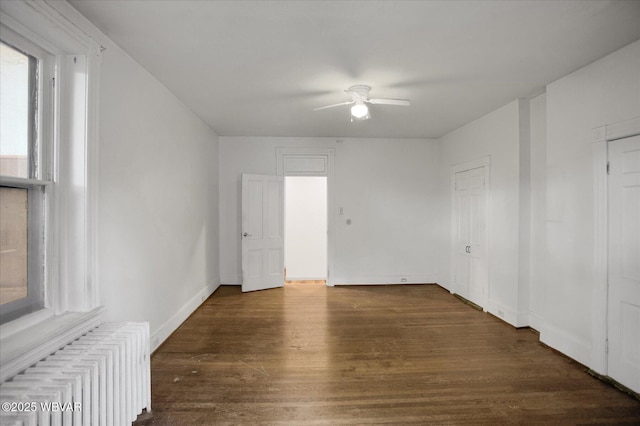 330 High St, Williamsport, PA 17701 - spare room with radiator, a ceiling fan, wood finished floors, and healthy amount of natural light