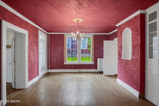 330 High St, Williamsport, PA 17701 - unfurnished dining area featuring radiator, hardwood / wood-style floors, a chandelier, baseboards, and ornamental molding