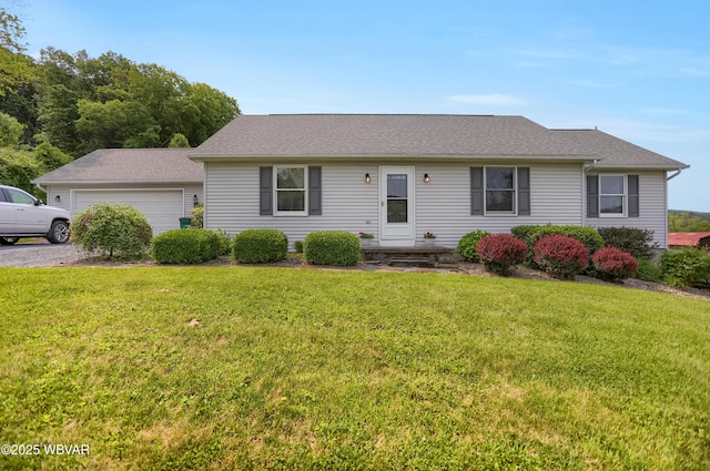 262 Walnut Ln, Jersey Shore, PA 17740 - view of front of home with a front yard, driveway, and an attached garage