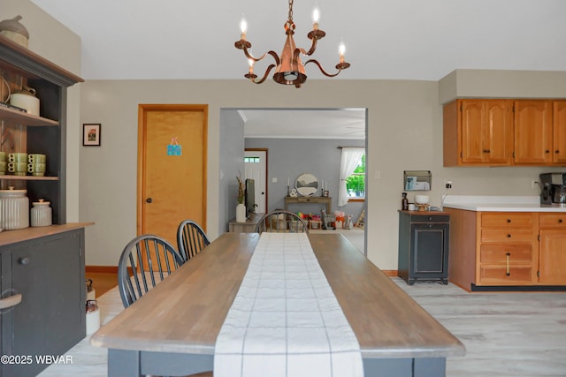 262 Walnut Ln, Jersey Shore, PA 17740 - dining area featuring light wood finished floors, a chandelier, and baseboards