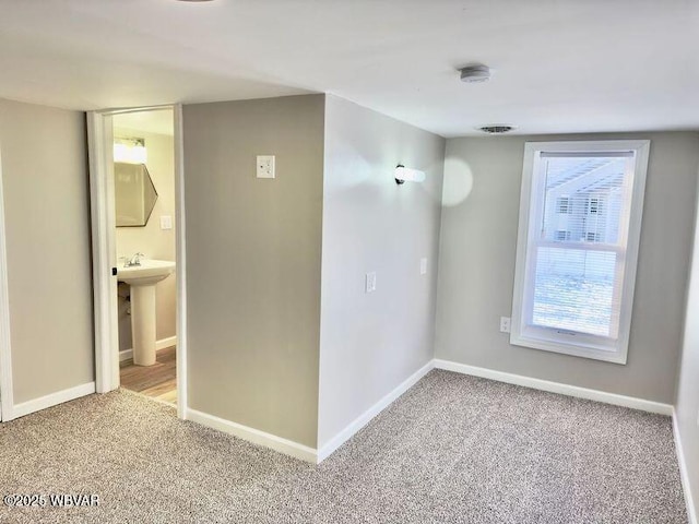 view of carpeted spare room