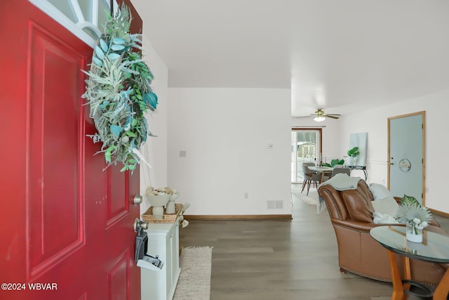 foyer entrance with ceiling fan and hardwood / wood-style flooring