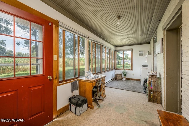 sunroom / solarium featuring plenty of natural light