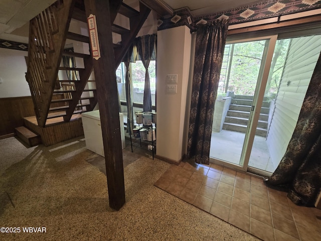 interior space featuring stairway and tile patterned floors